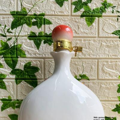 Bình Đựng Rượu Bằng Sứ Đắp Nổi Sen Cá